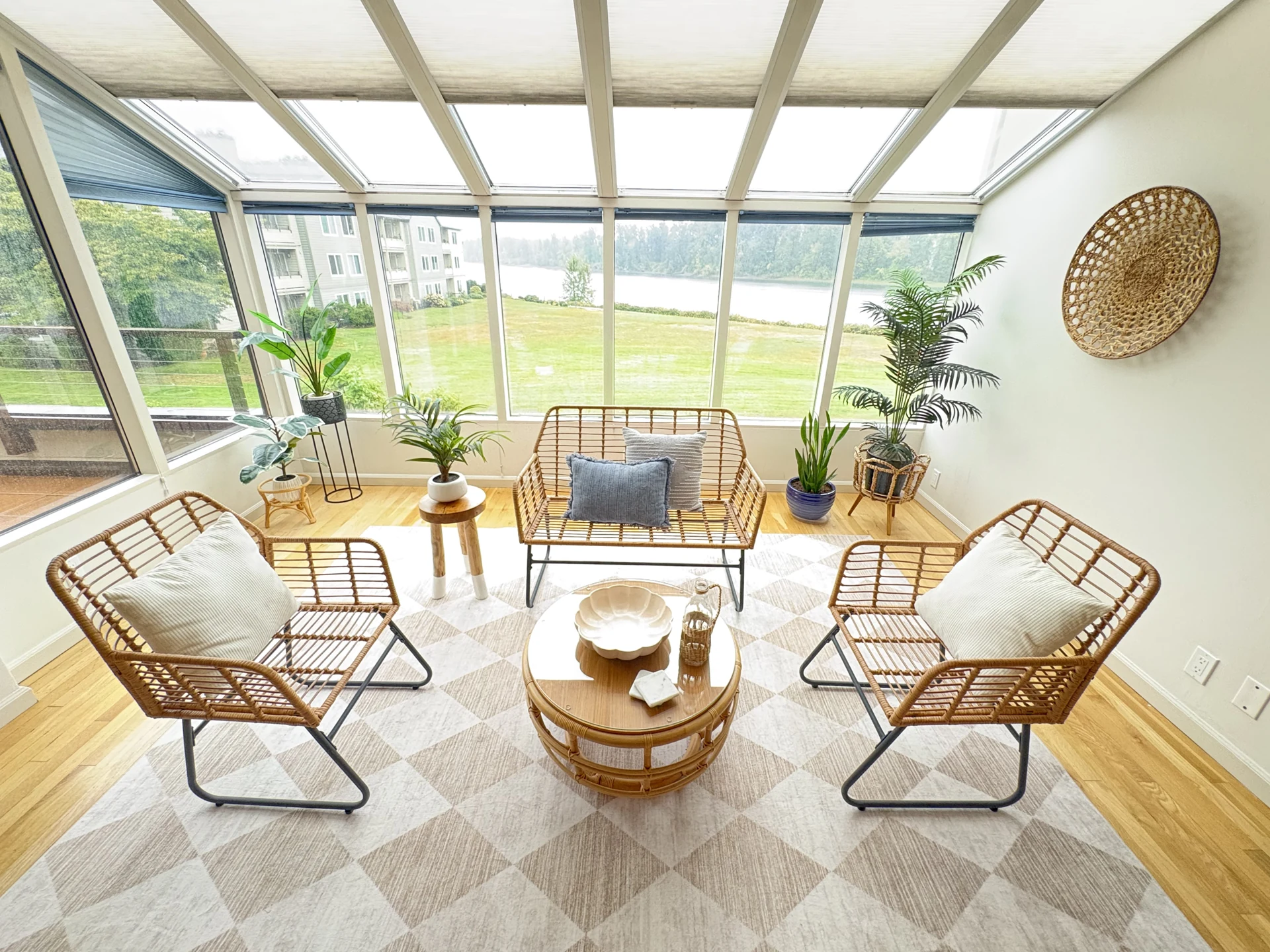 John’s Landing II sunroom with wicker seating