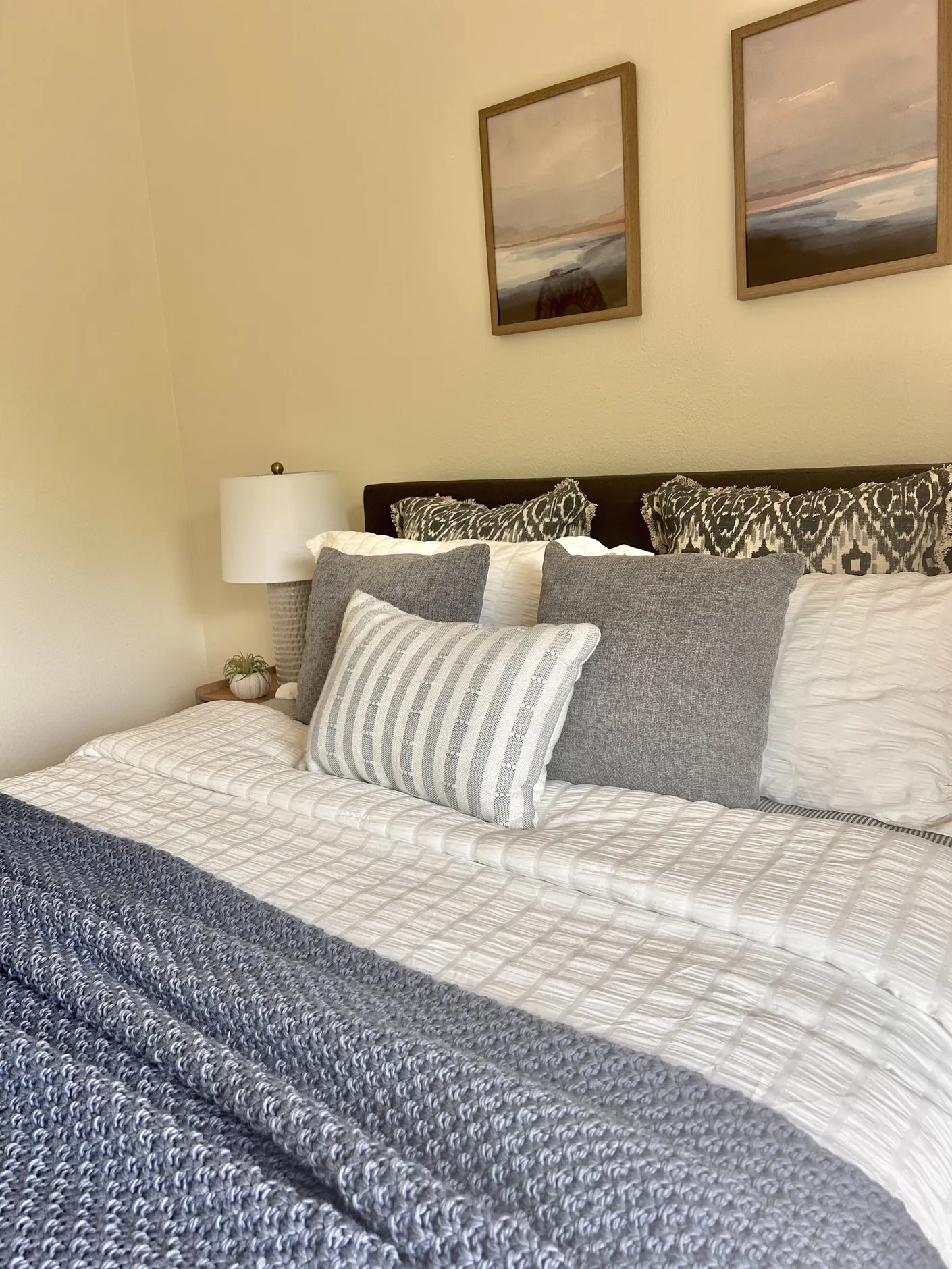 Close view of the bedroom pillows and bedding