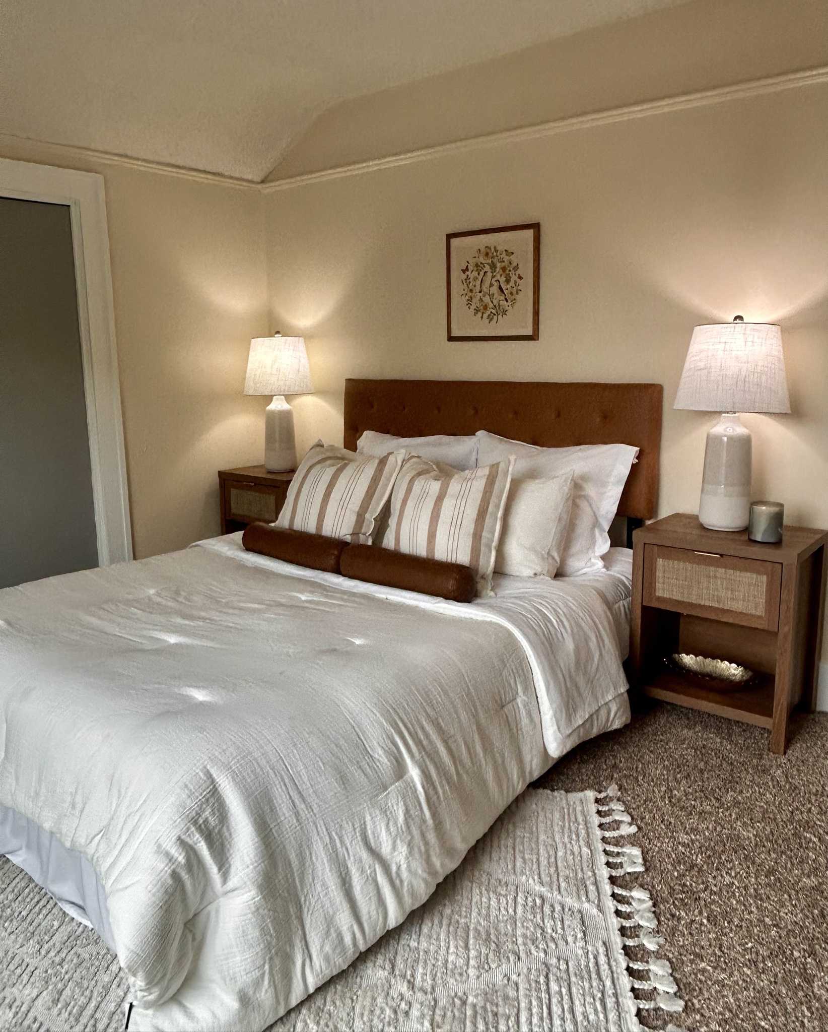 N. Denver primary bedroom with layered white bedding