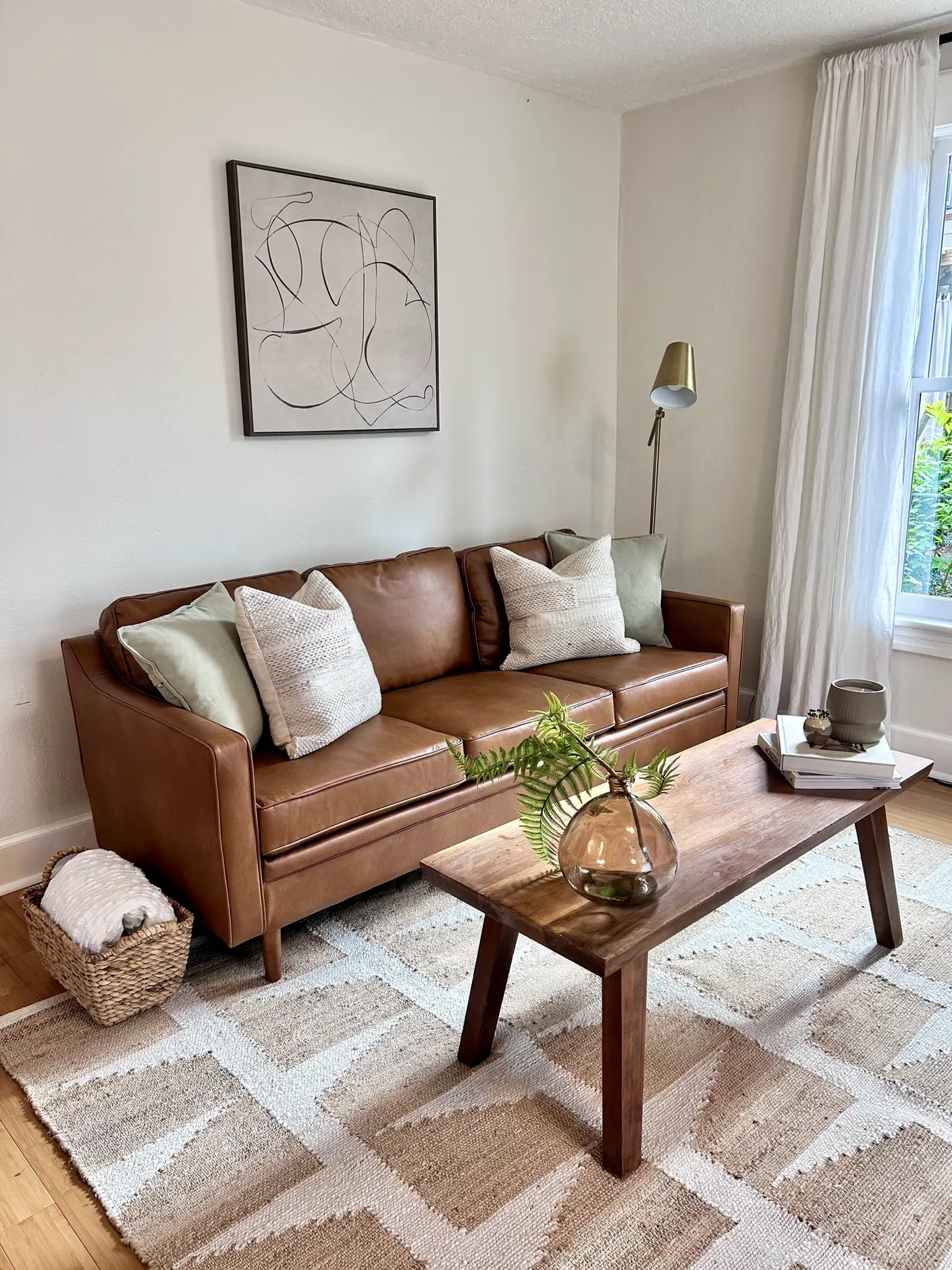 Brown leather sofa and wood coffee table in the living room