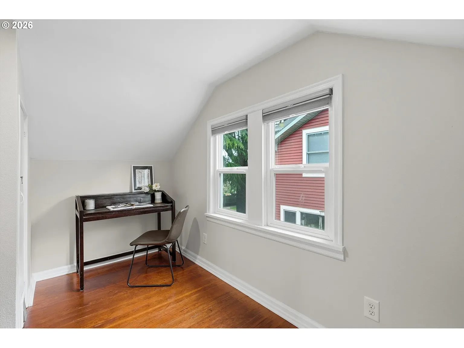 Writing desk beside the upstairs window